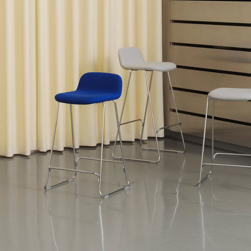 Just Full Upholstery Barstool by Normann Copenhagen, showing closeup view of just full upholstery barstool in live shot.