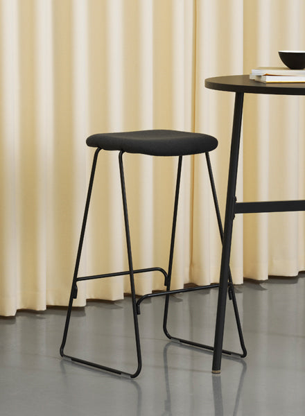 Just Full Upholstery Barstool by Normann Copenhagen, showing just full upholstery barstool in live shot.