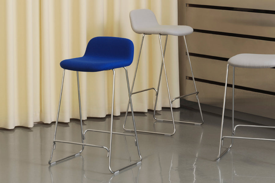 Just Full Upholstery Barstool with Backrest by Normann Copenhagen, showing just full upholstery barstools with backrest in live shot.