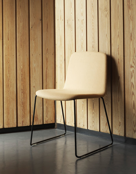 Just Full Upholstery Chair by Normann Copenhagen, showing just full upholstery chair in live shot.