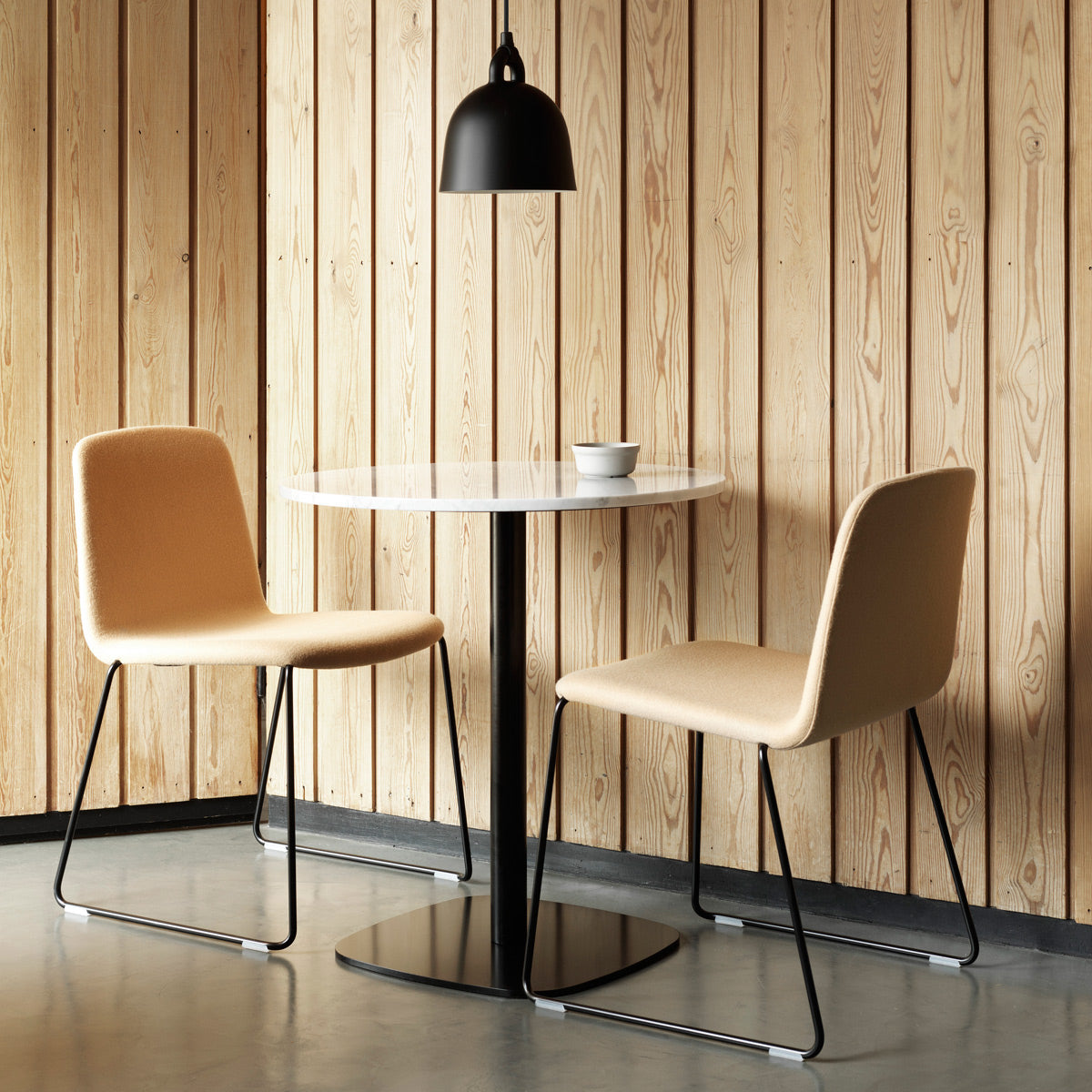 Just Full Upholstery Chair by Normann Copenhagen, showing just full upholstery chairs in live shot.