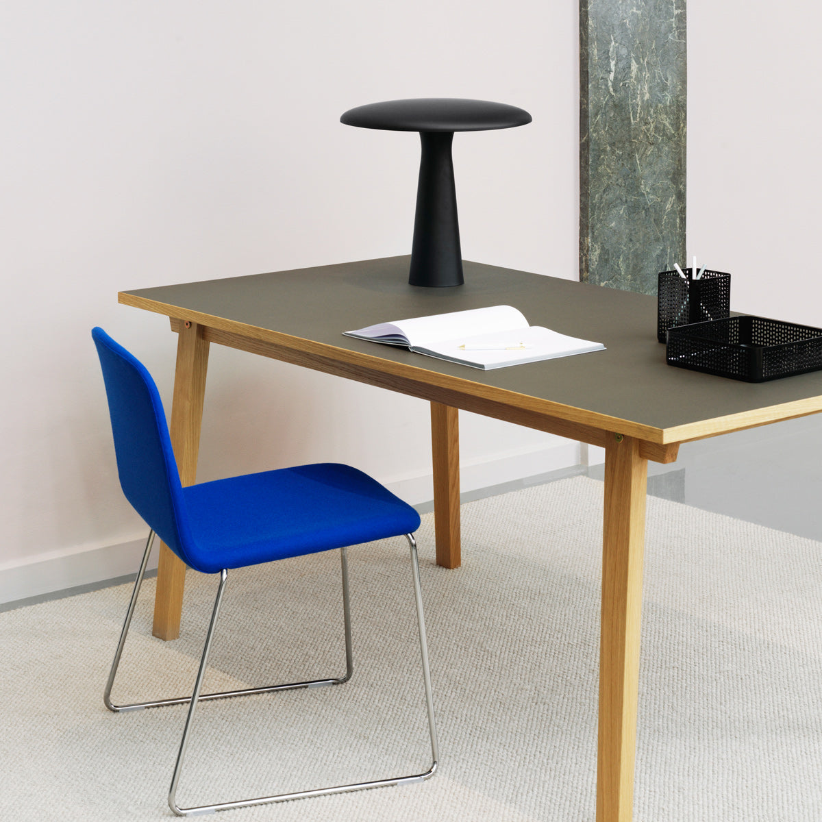 Just Full Upholstery Chair by Normann Copenhagen, showing just full upholstery chair in live shot.