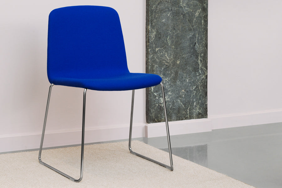 Just Full Upholstery Chair by Normann Copenhagen, showing just full upholstery chair in live shot.
