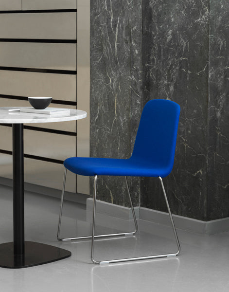Just Full Upholstery Chair by Normann Copenhagen, showing just full upholstery chair in live shot.