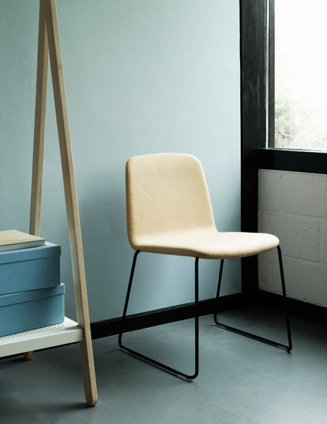 Just Full Upholstery Chair by Normann Copenhagen, showing just full upholstery chair in live shot.