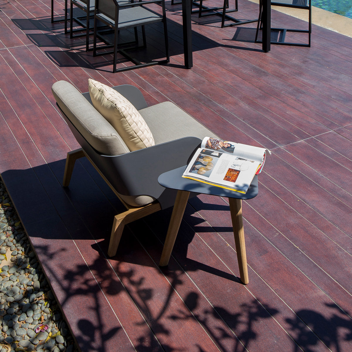 Kaat Teak 1-Seater Sofa by Mamagreen, showing kaat teak 1-seater sofa in live shot.