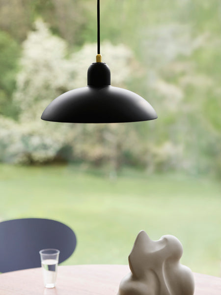 Kaiser Idell Pendant by Fritz Hansen, showing kaiser idell pendant in live shot.