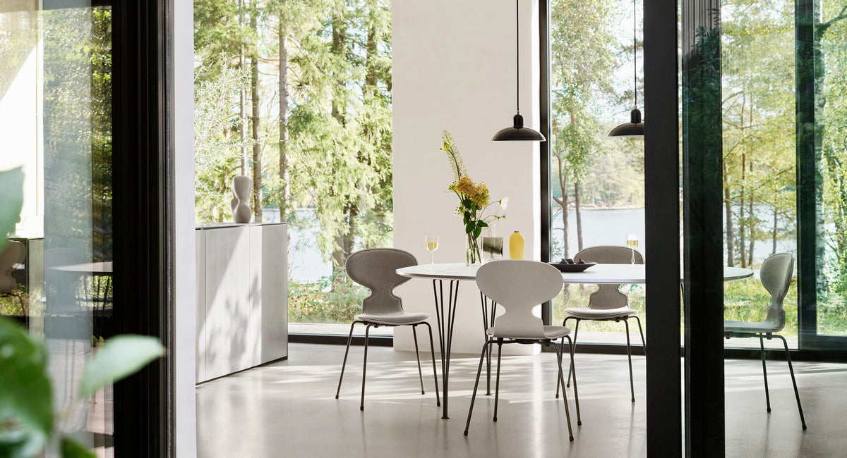 Kaiser Idell Pendant by Fritz Hansen, showing kaiser idell pendants in live shot.