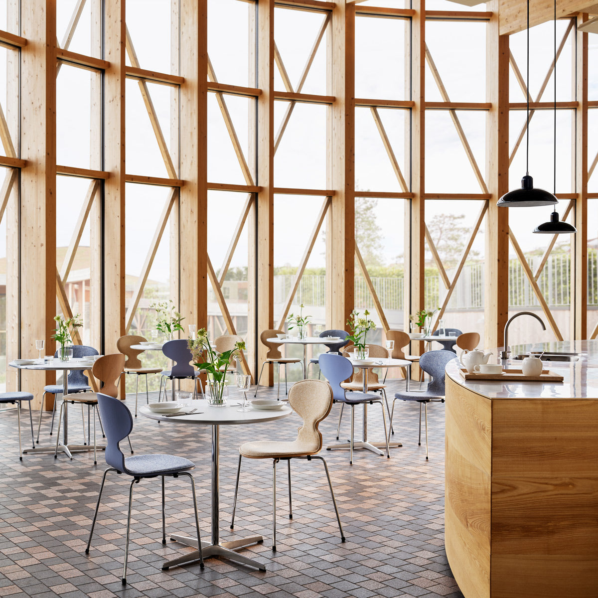 Kaiser Idell Pendant by Fritz Hansen, showing kaiser idell pendants in live shot.