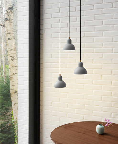 Kaiser Idell Pendant by Fritz Hansen, showing kaiser idell pendants in live shot.