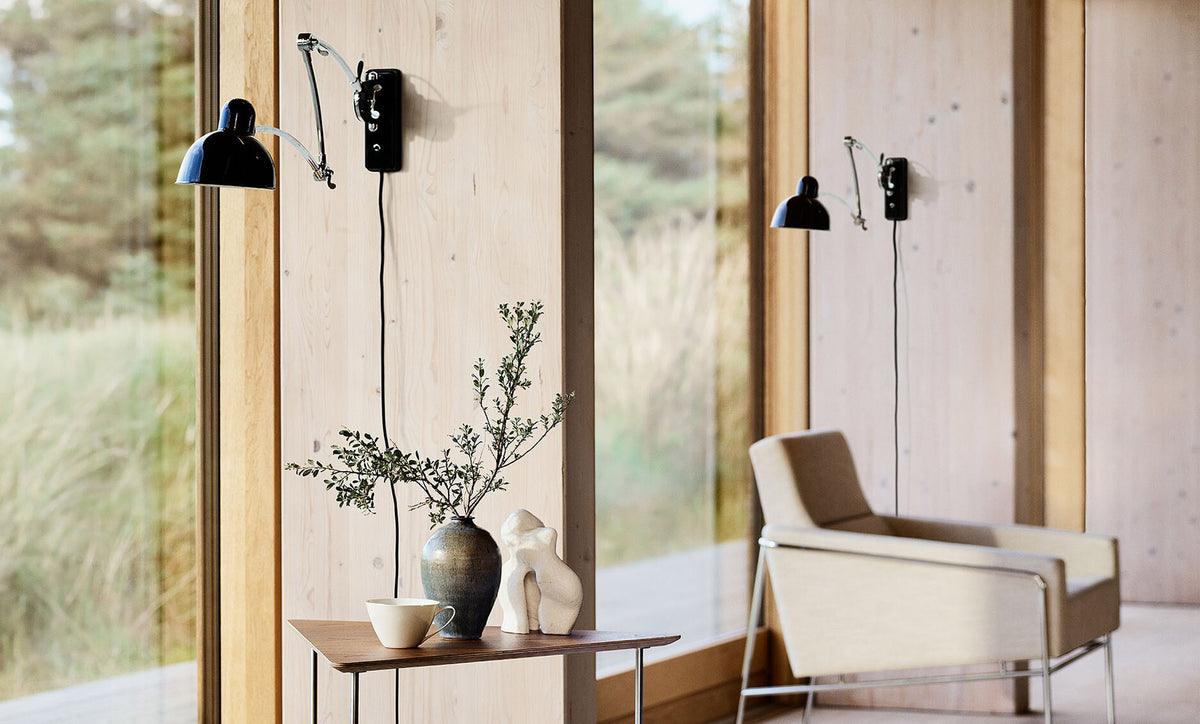 Kaiser Idell Wall Lamp by Fritz Hansen, showing kaiser idell wall lamps in live shot.