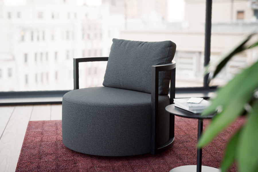Kav Swivel Lounge Chair by B&T, showing kav swivel lounge chair in live shot.
