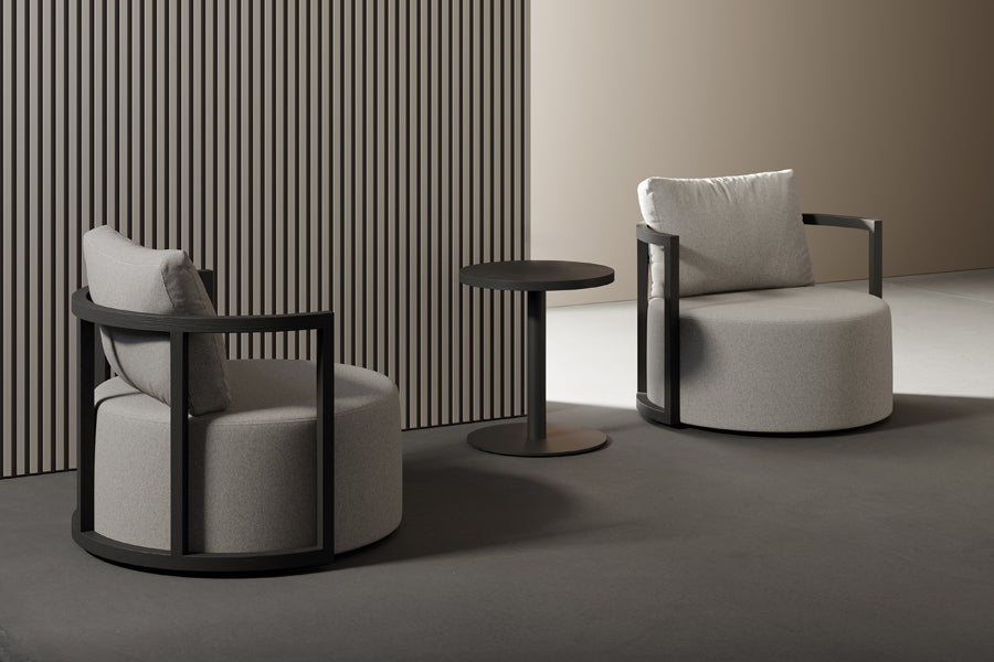 Kav Swivel Lounge Chair by B&T, showing kav swivel lounge chairs in live shot.
