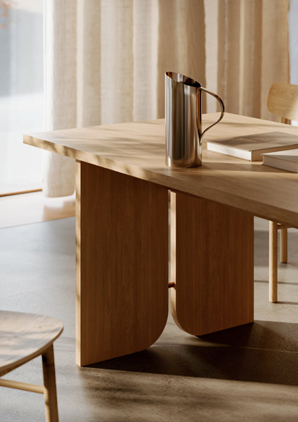 Kimono Dining Table by Woud, showing closeup view of kimono dining table in live shot.