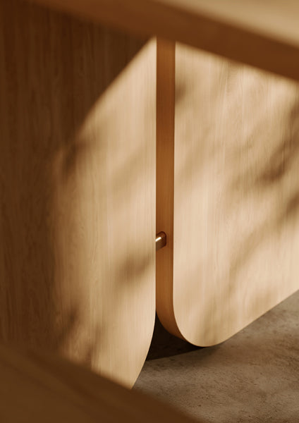 Kimono Dining Table by Woud, showing closeup view of kimono dining table in live shot.
