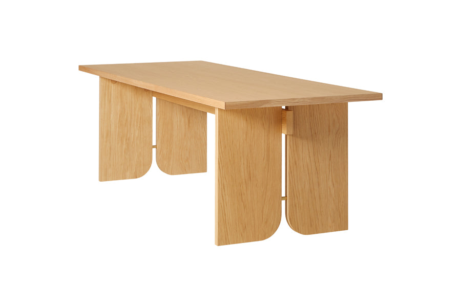 Kimono Dining Table by Woud, showing angle view of kimono dining table in oak.
