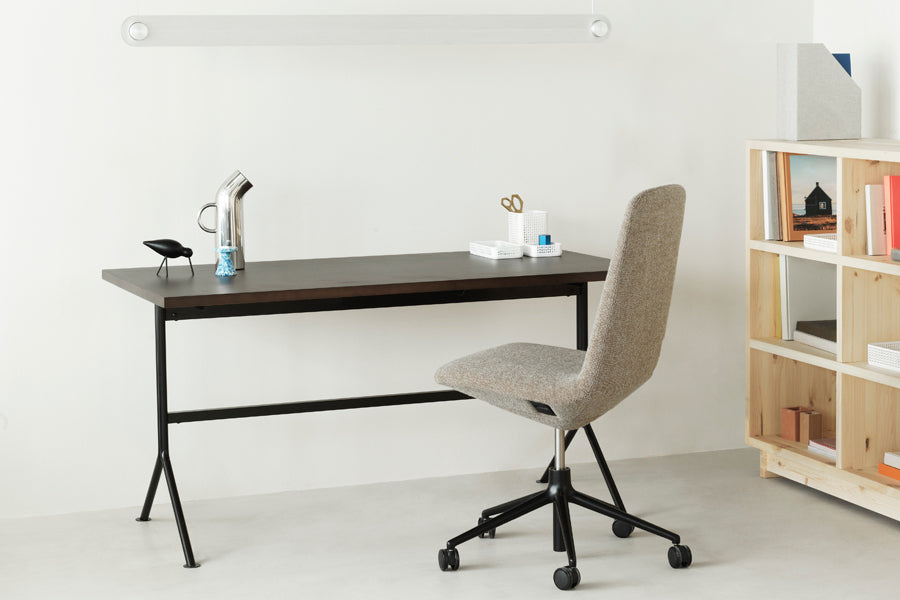 Kip Desk by Normann Copenhagen, showing kip desk with chair in live shot.