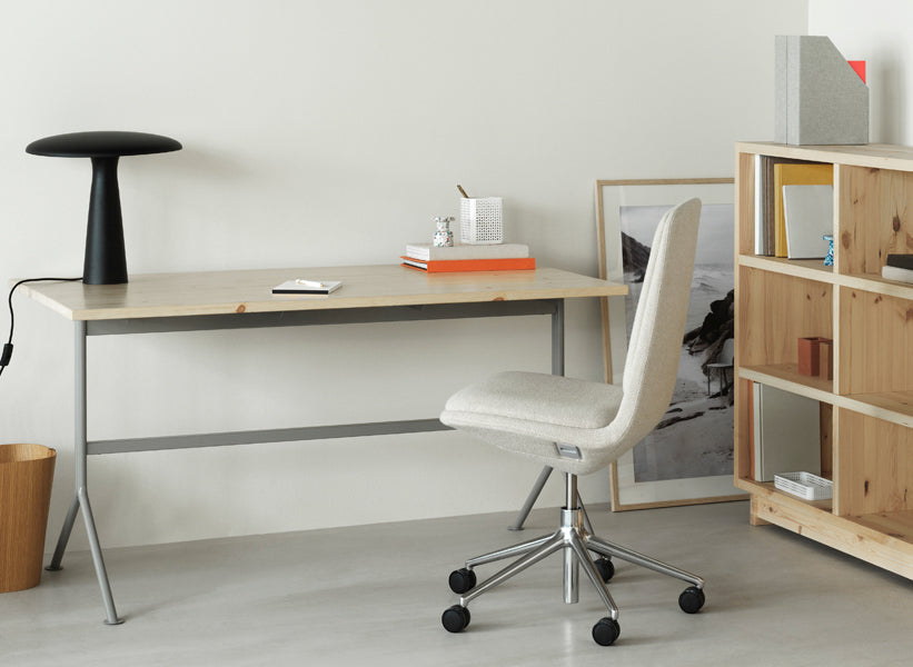 Kip Desk by Normann Copenhagen, showing kip desk with chair in live shot.