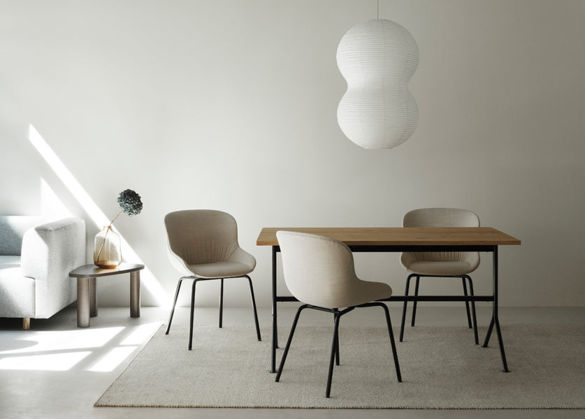 Kip Desk by Normann Copenhagen, showing kip desk with chairs in live shot.