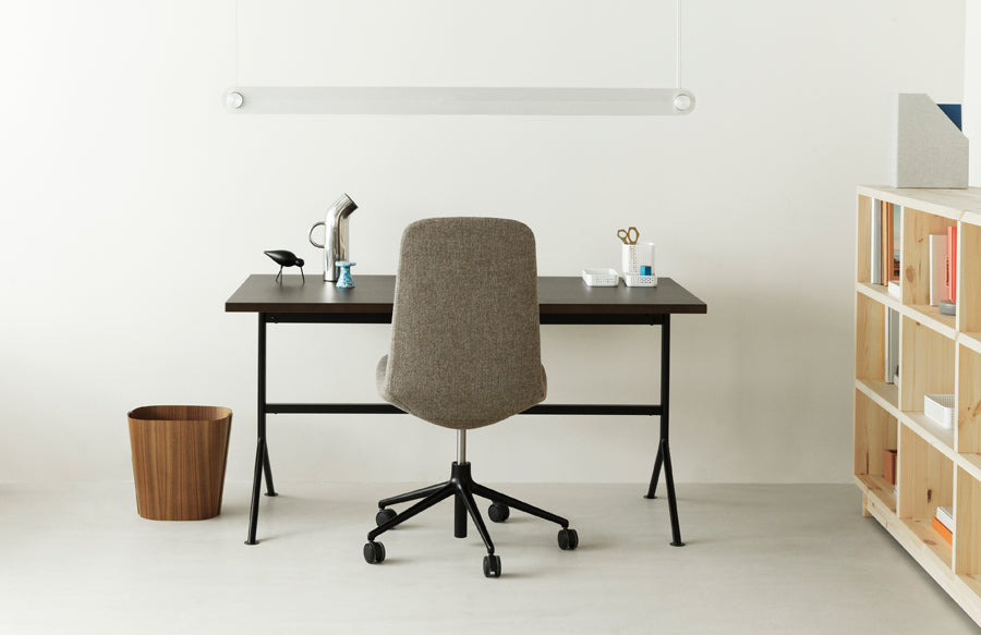 Kip Desk by Normann Copenhagen, showing kip desk with chair in live shot.