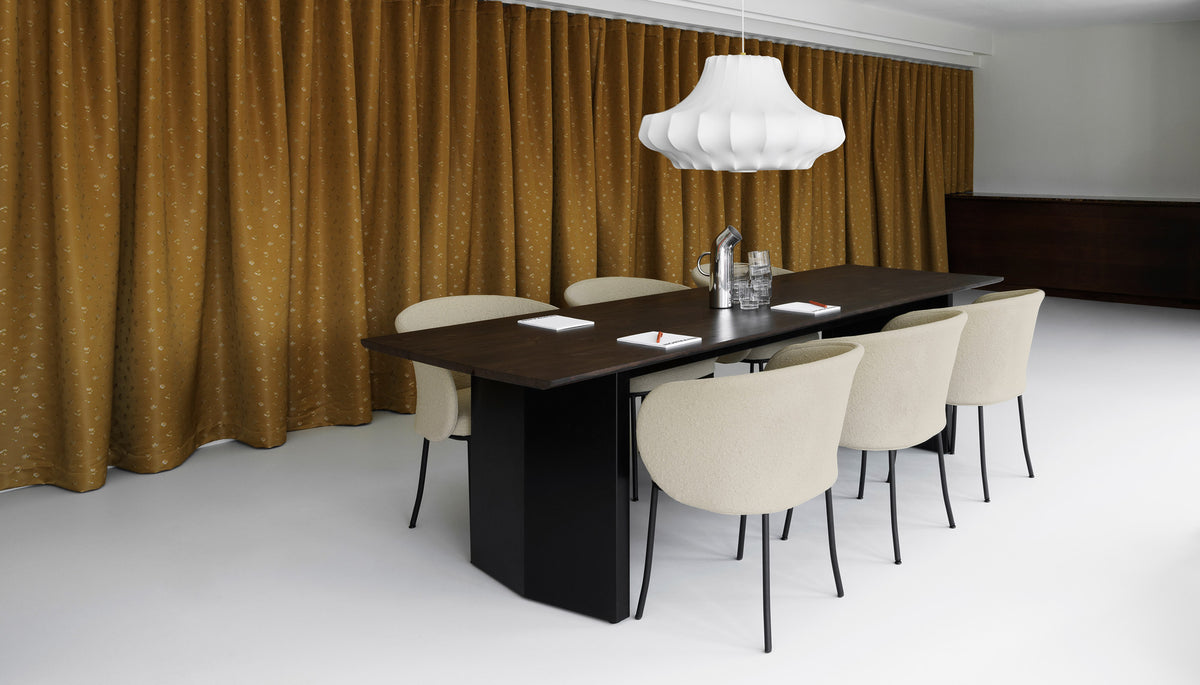 Knit Armchair by Normann Copenhagen, showing knit armchairs in live shot.