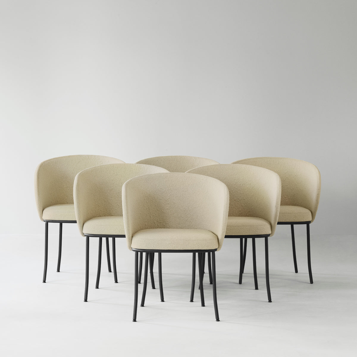Knit Armchair by Normann Copenhagen, showing knit armchairs in live shot.