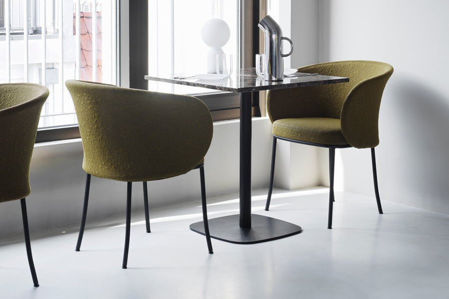 Knit Armchair by Normann Copenhagen, showing knit armchairs in live shot.