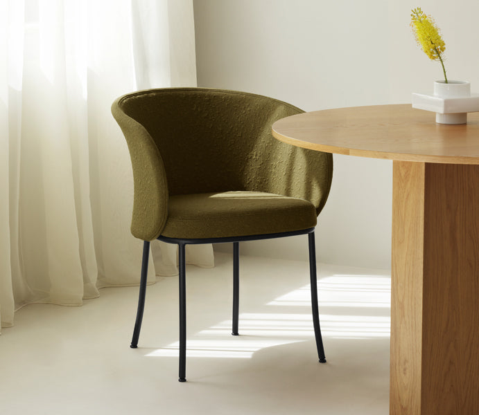 Knit Armchair by Normann Copenhagen, showing knit armchair in live shot.