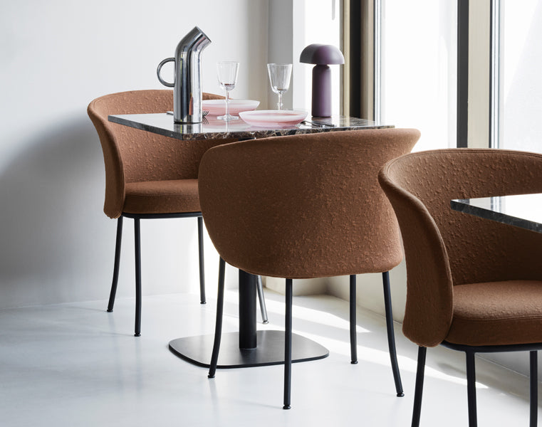 Knit Armchair by Normann Copenhagen, showing knit armchairs in live shot.