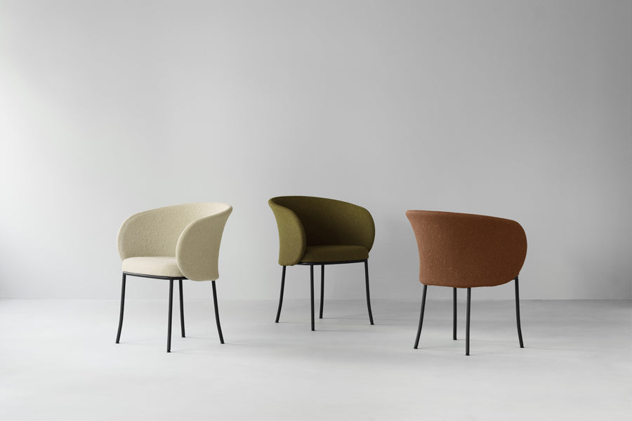 Knit Armchair by Normann Copenhagen, showing knit armchairs in live shot.