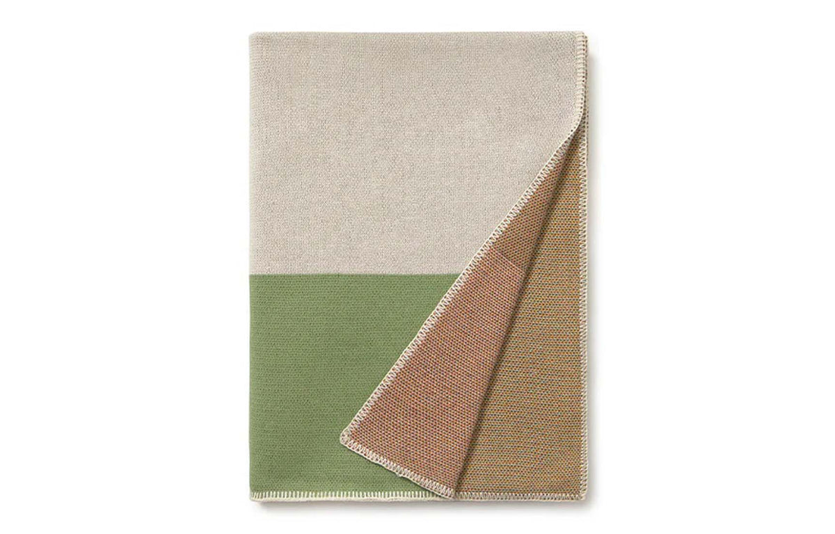 Knitted Color Composition Blanket by Lorena Canals, showing front view of knitted color composition blanket.