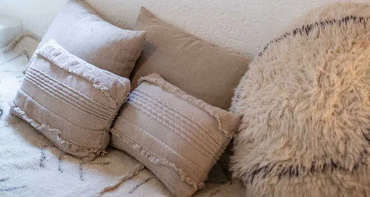 Knitted Cushion Air Dune White by Lorena Canals, showing knitted cushion air dune white in live shot.