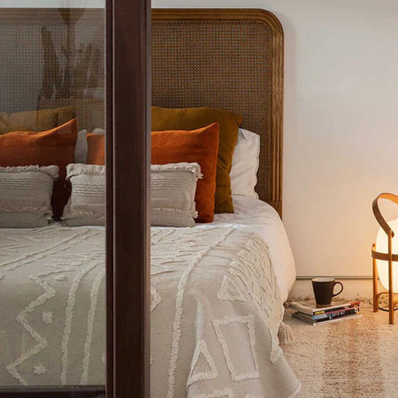 Knitted Cushion Air Dune White by Lorena Canals, showing knitted cushion air dune white in live shot.
