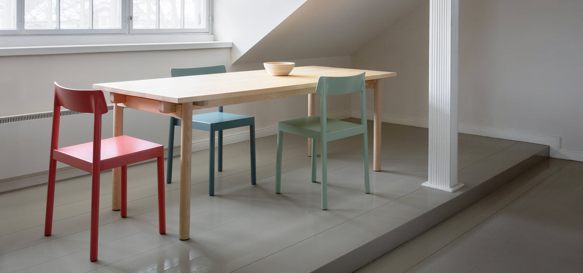 Kumu Chair by Nikari, showing kumu chairs in live shot.