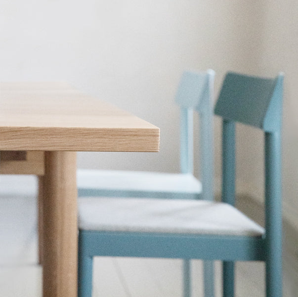 Kumu Chair by Nikari, showing closeup view of kumu chairs in live shot.