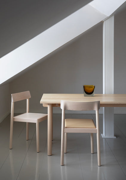 Kumu Chair by Nikari, showing kumu chairs in live shot.