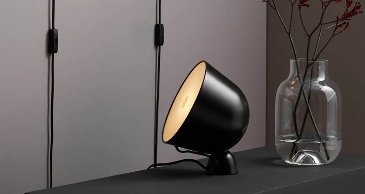 Kuppi Wall Lamp 2.0 by Woud, showing kuppi wall lamp 2.0 in live shot.