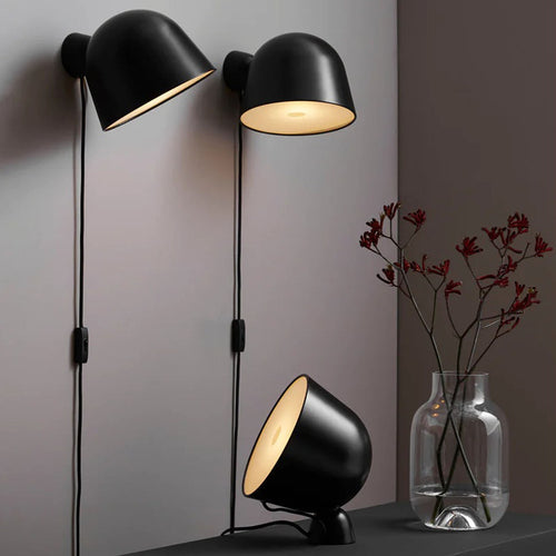 Kuppi Wall Lamp 2.0 by Woud, showing kuppi wall lamp 2.0 in live shot.