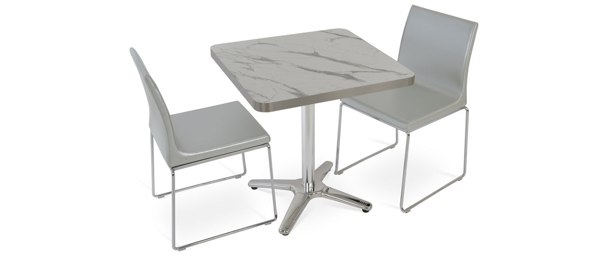 Lamer Commercial Table by SohoConcept, showing angle veiw of lamer commercial table with chairs.