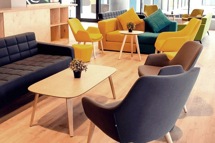 Lamy Dowel Wood Lounge Chair by B&T, showing lamy dowel wood lounge chairs in live shot.