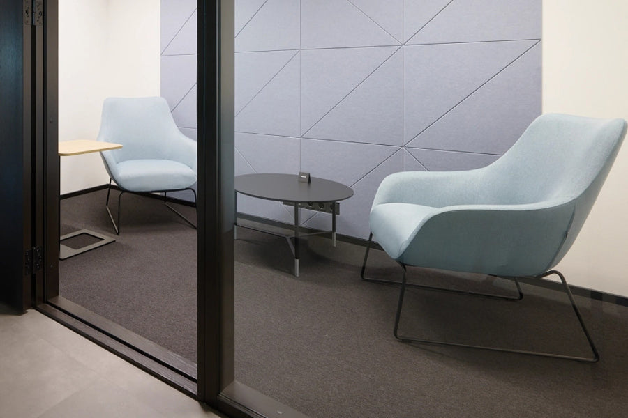 Lamy Sled Lounge Chair by B&T, showing lamy sled lounge chairs in live shot.
