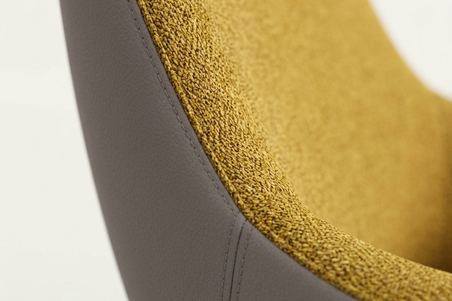 Lamy Wood Lounge Chair by B&T, showing closeup view of lamy wood lounge chair in live shot.