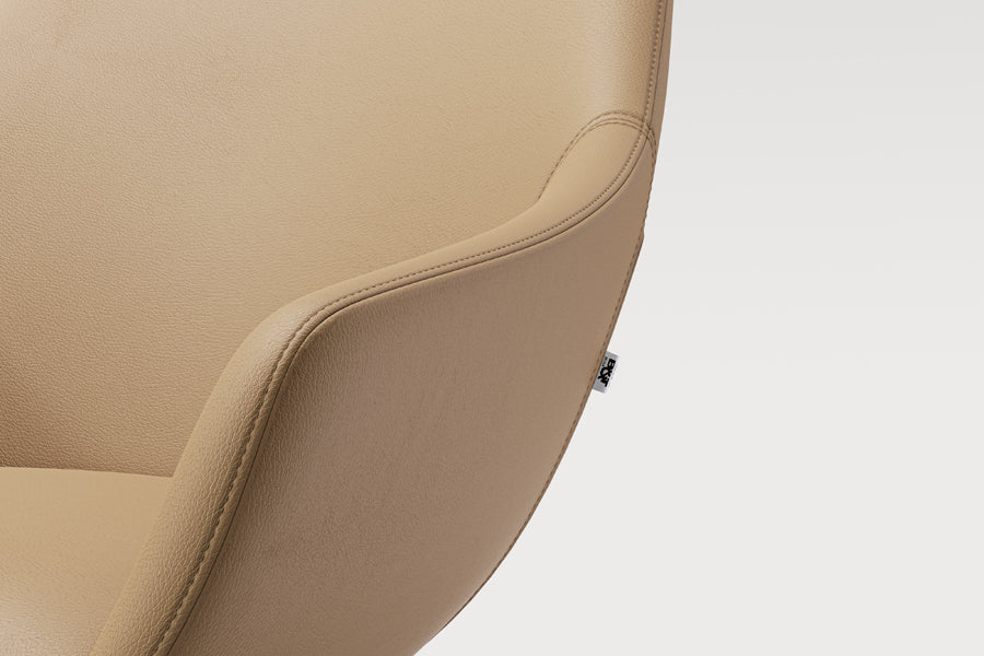 Lamy Wood Lounge Chair w/Headrest by B&T, showing closeup view of lamy wood lounge chair w/ headrest in live shot.