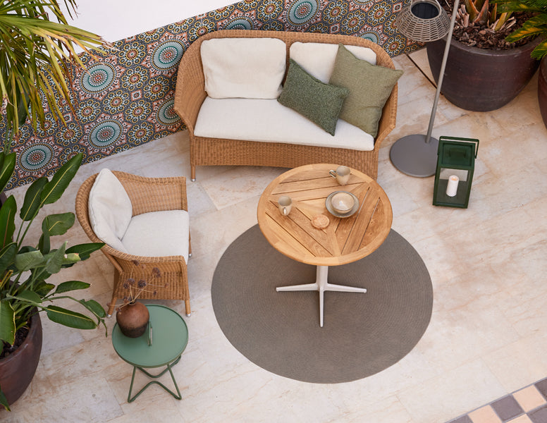Lansing 2-Seater Sofa by Cane-Line, showing lansing 2 seater sofa in live shot.