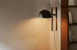 Lauro Wall Lamp by Marset, showing lauro wall lamp in live shot.