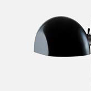 Lauro Wall Lamp by Marset, showing closeup view of lauro wall lamp in live shot.