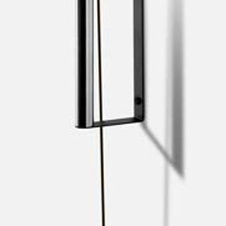 Lauro Wall Lamp by Marset, showing closeup view of lauro wall lamp in live shot.