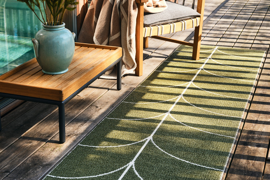 Leif Seagrass Runner Rug by Pappelina, showing leif seagrass runner rug in live shot.
