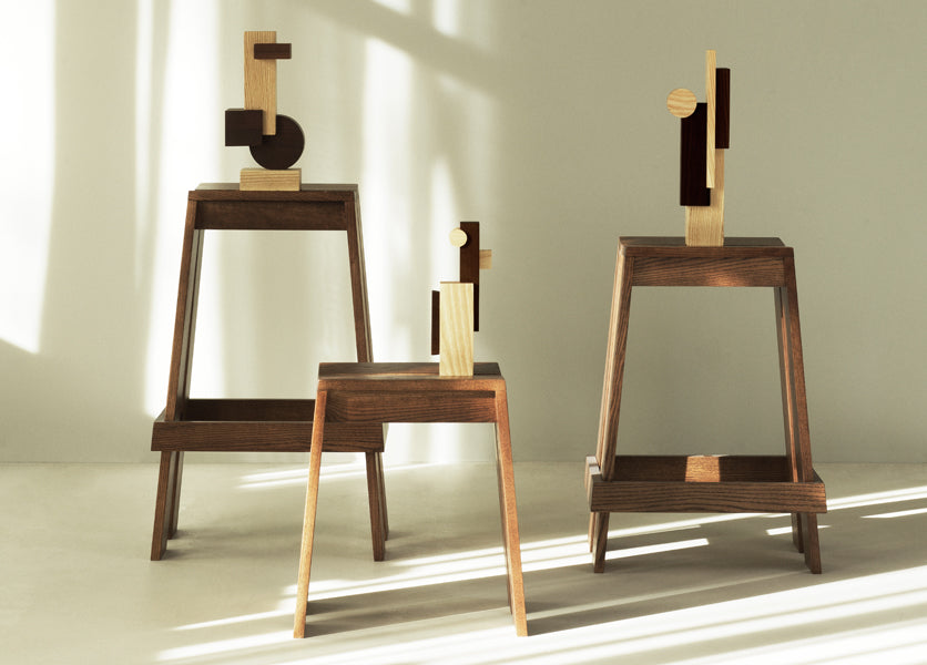 Let Stool by Normann Copenhagen, showing let stool with barstools in live shot.