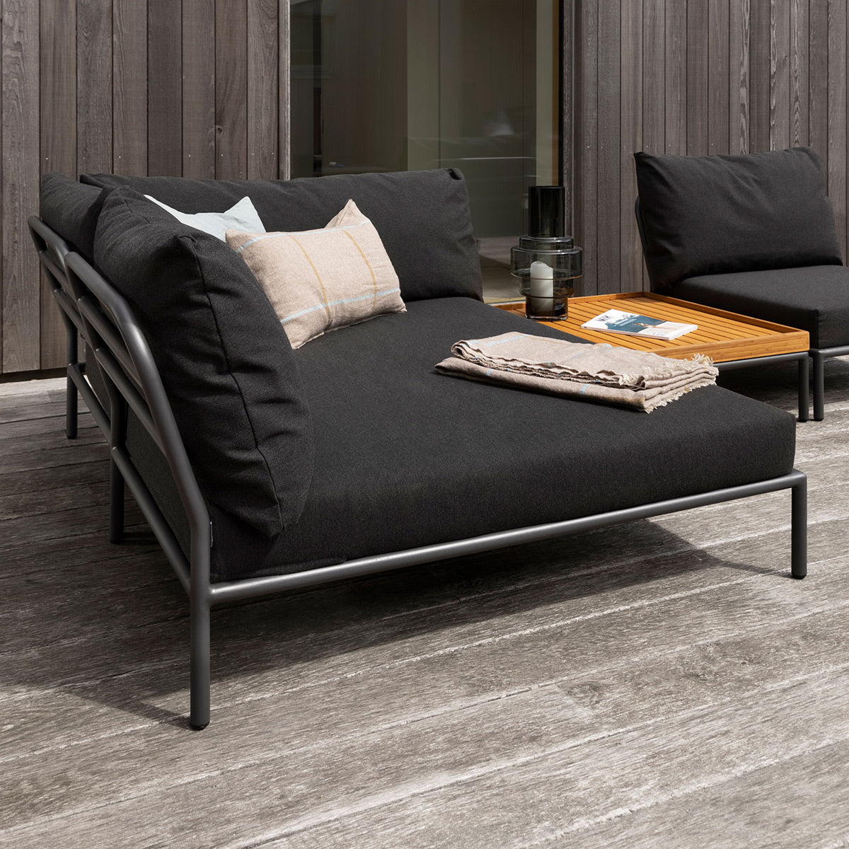 Level 2 Outdoor Lounge Sectional Chair by Houe, showing closeup view of level 2 outdoor lounge sectional chair in live shot.